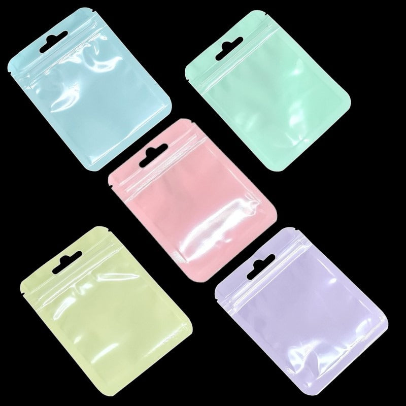 PET Ziplock BAG - Transparent FRONT WITH MIXED Colour Backing - Outside ±7.5×10 Cm - Inside ±6.2×7 Cm - Thickness 80 Microns