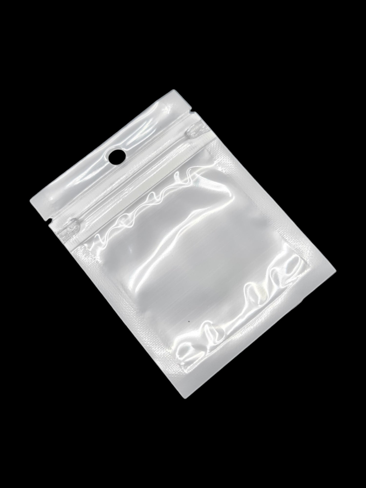 PET Ziplock BAG - Transparent FRONT AND WHITE BACK ±6×8 Cm ±100-Piece
