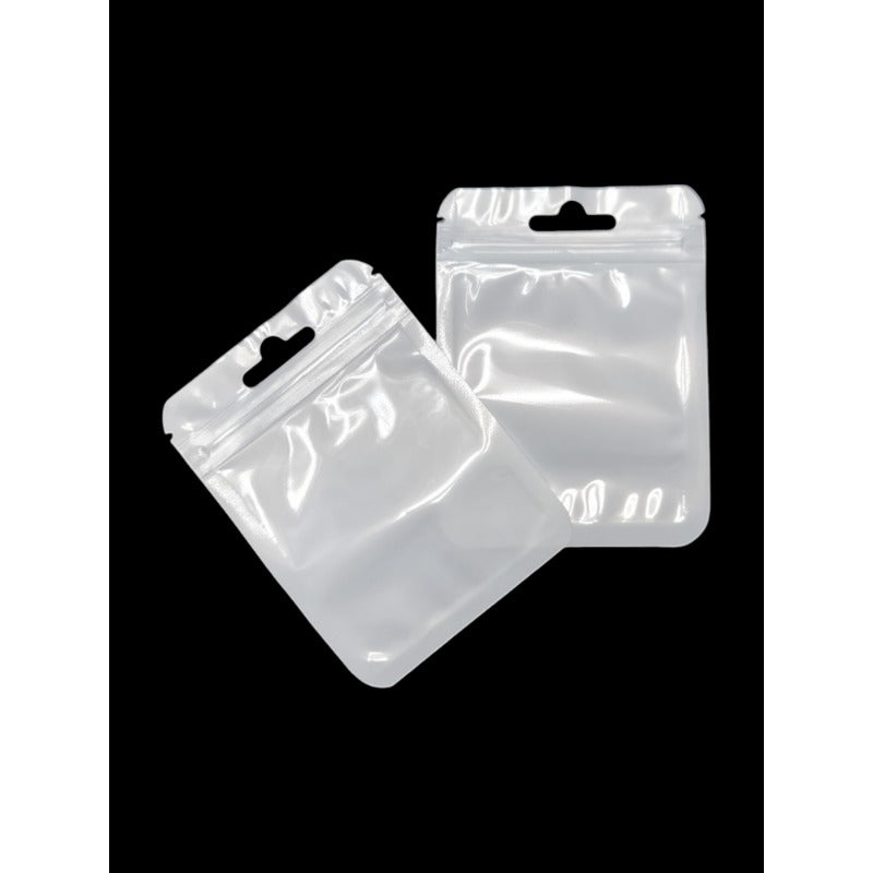 PET Ziplock BAG - Transparent FRONT AND WHITE BACK - Outside ±7.5×10 Cm - Inside ±6.2×7 Cm - Thickness 80 Microns ±50-Piece -